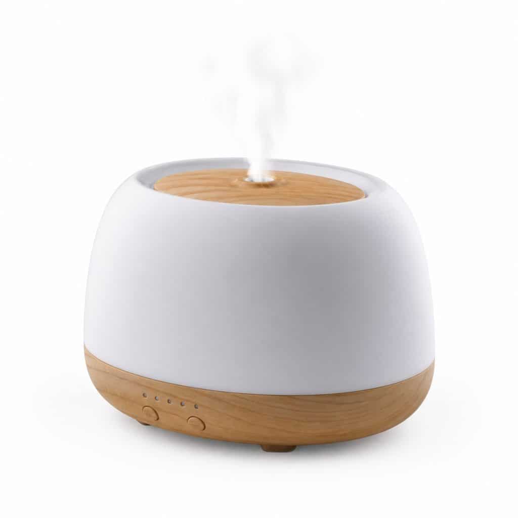 Diffuseur d'huiles essentielles apaisantes avec minuterie présenté seul